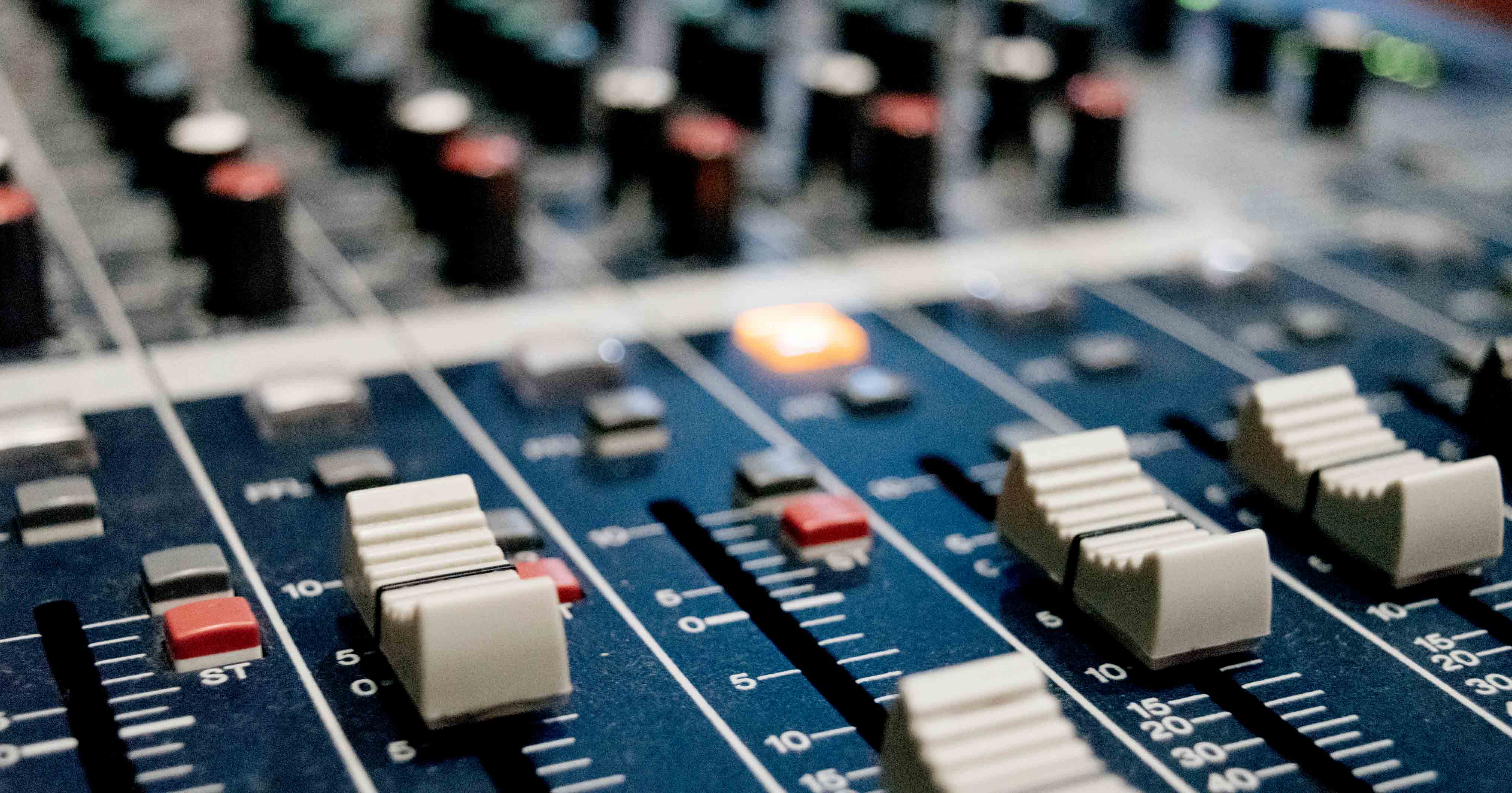 Image of an audio mixing desk
